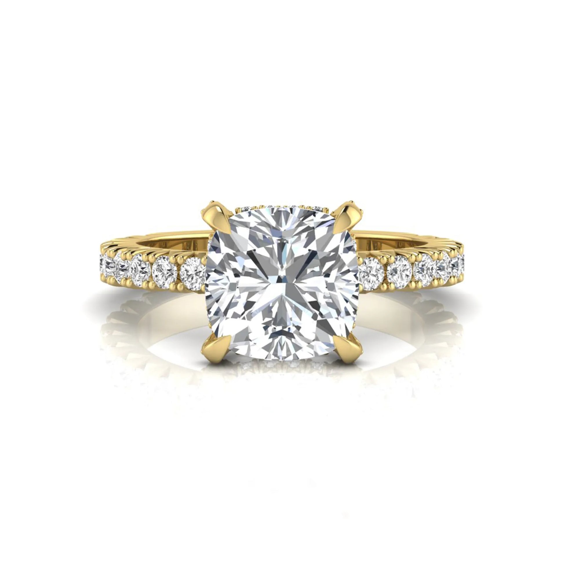 Cushion cut lab grown diamond engagement ring featuring a four-prong setting with round pavé side diamonds and yellow gold tone band.