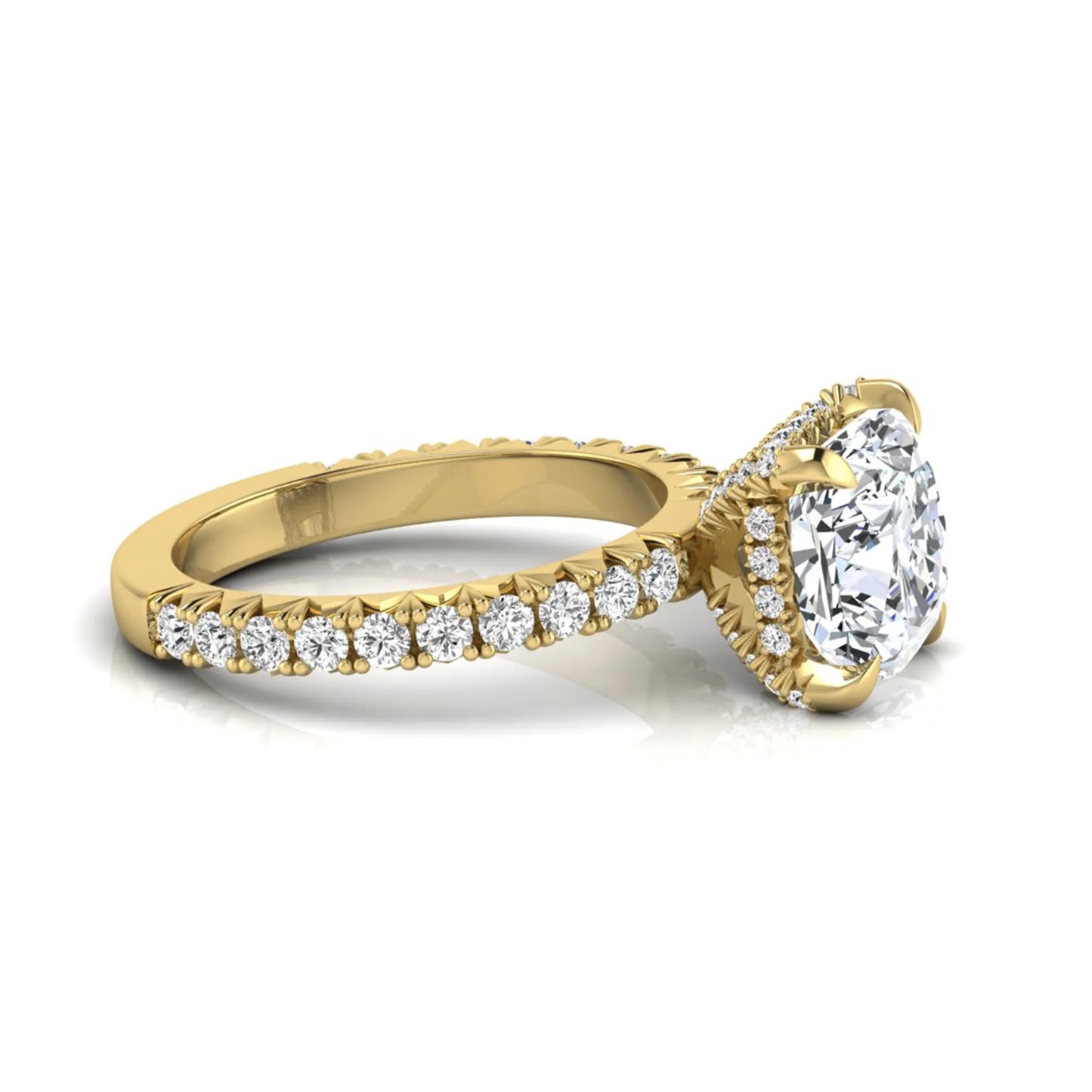 Cushion cut lab grown diamond engagement ring featuring a four-prong setting with round pavé side diamonds and yellow gold tone band.