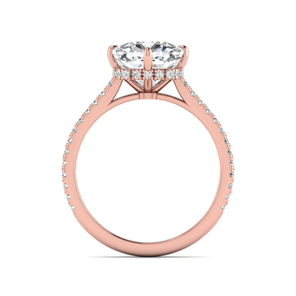 Cushion cut lab grown diamond hidden halo engagement ring featuring a 2.75 carat IGI certified center diamond with a pavé diamond band in rose gold.