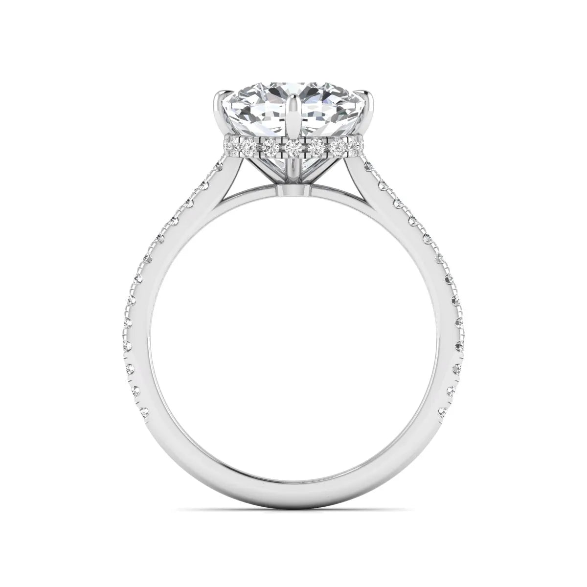Cushion cut lab grown diamond hidden halo engagement ring featuring a 2.75 carat IGI certified center diamond with a pavé diamond band in white gold.