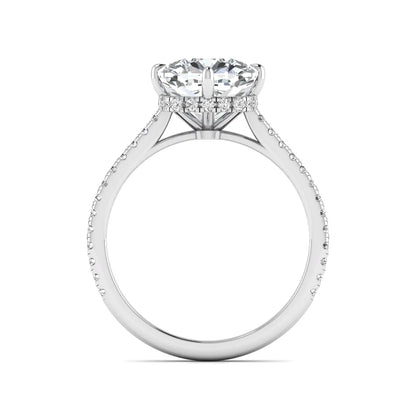 Cushion cut lab grown diamond hidden halo engagement ring featuring a 2.75 carat IGI certified center diamond with a pavé diamond band in white gold.