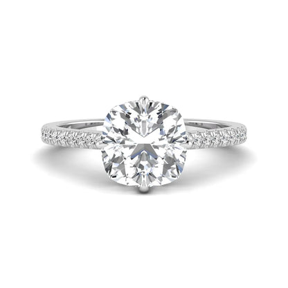 Cushion cut lab grown diamond hidden halo engagement ring featuring a 2.75 carat IGI certified center diamond with a pavé diamond band in white gold.