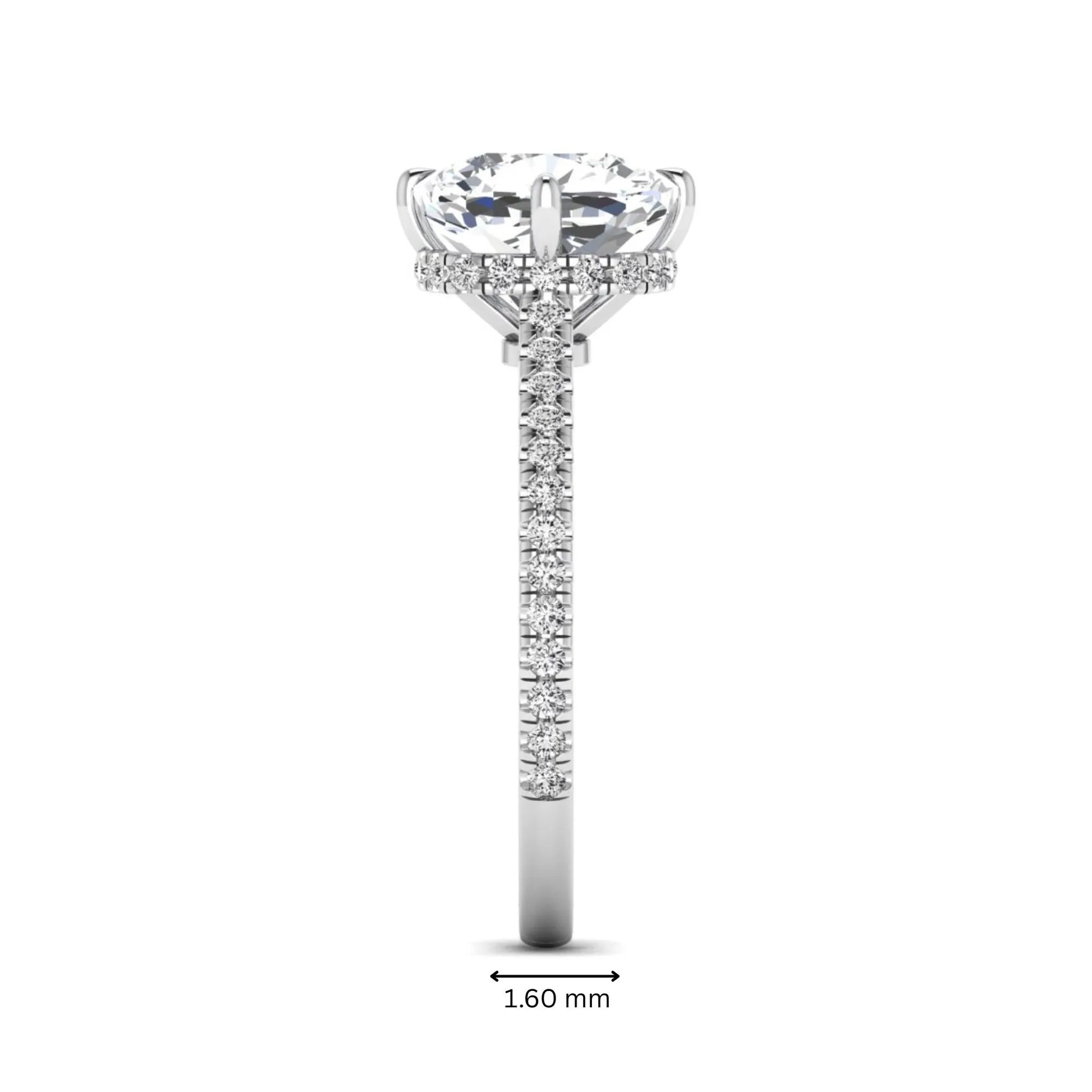 Cushion cut lab grown diamond hidden halo engagement ring featuring a 2.75 carat IGI certified center diamond with a pavé diamond band in white gold.