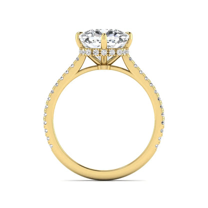 Cushion cut lab grown diamond hidden halo engagement ring featuring a 2.75 carat IGI certified center diamond with a pavé diamond band in yellow gold.