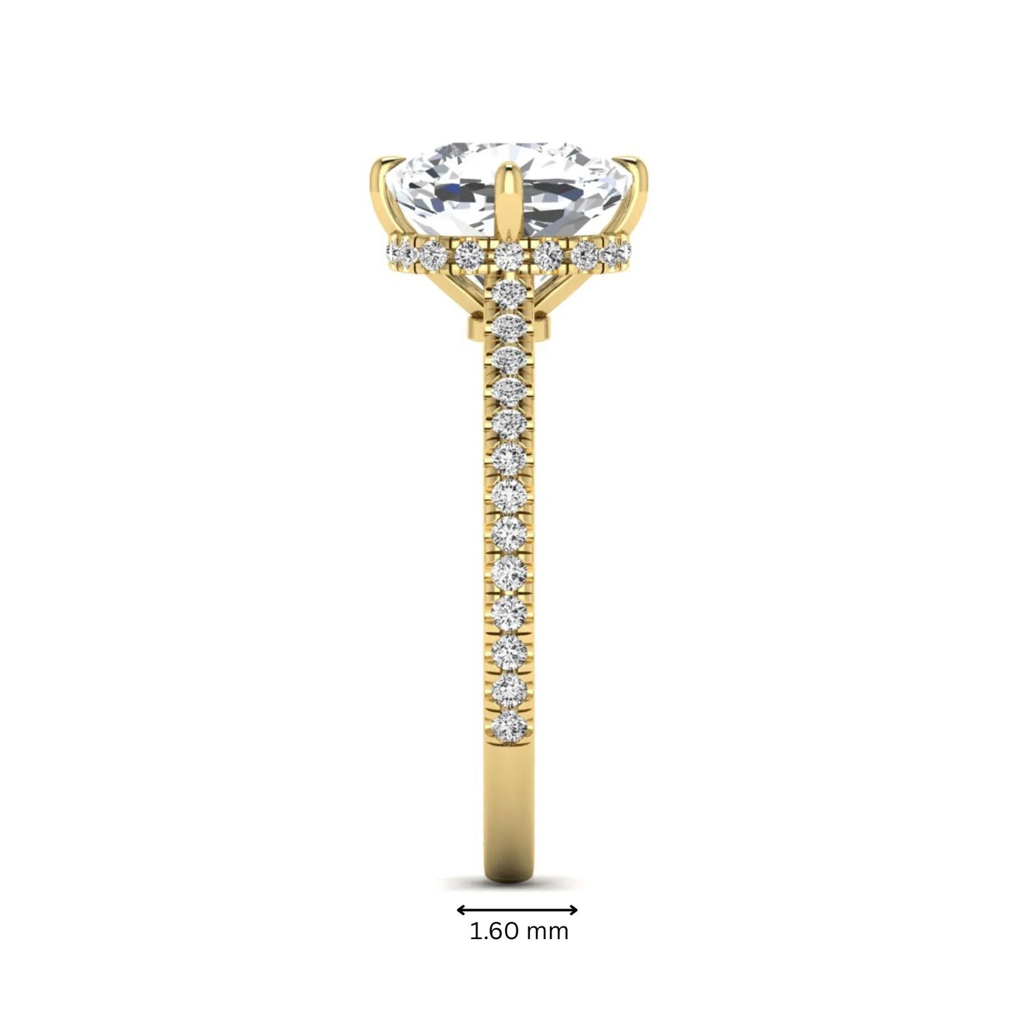 Cushion cut lab grown diamond hidden halo engagement ring featuring a 2.75 carat IGI certified center diamond with a pavé diamond band in yellow gold.