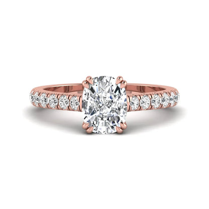 IGI certified cushion cut lab grown diamond solitaire accent engagement ring with pavé round diamond band in rose gold.