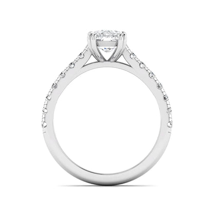 IGI certified cushion cut lab grown diamond solitaire accent engagement ring with pavé round diamond band in white gold.