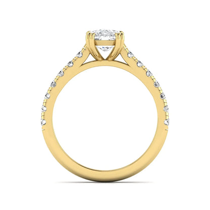 IGI certified cushion cut lab grown diamond solitaire accent engagement ring with pavé round diamond band in yellow gold.