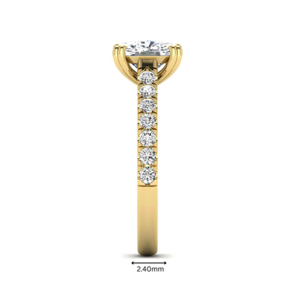 IGI certified cushion cut lab grown diamond solitaire accent engagement ring with pavé round diamond band in yellow gold.