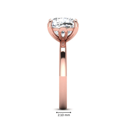 Cushion cut lab grown diamond solitaire engagement ring featuring a 3.35 carat IGI certified center diamond in rose gold.