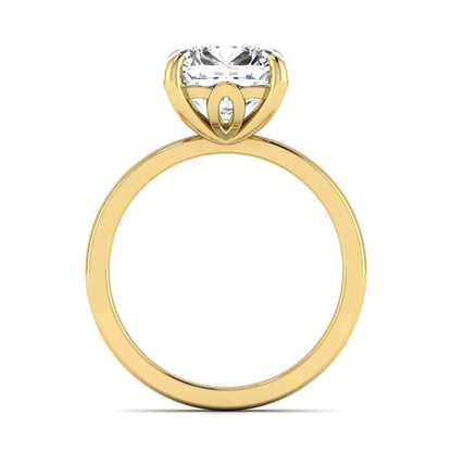 Cushion cut lab grown diamond solitaire engagement ring featuring a 3.35 carat IGI certified center diamond in yellow gold.