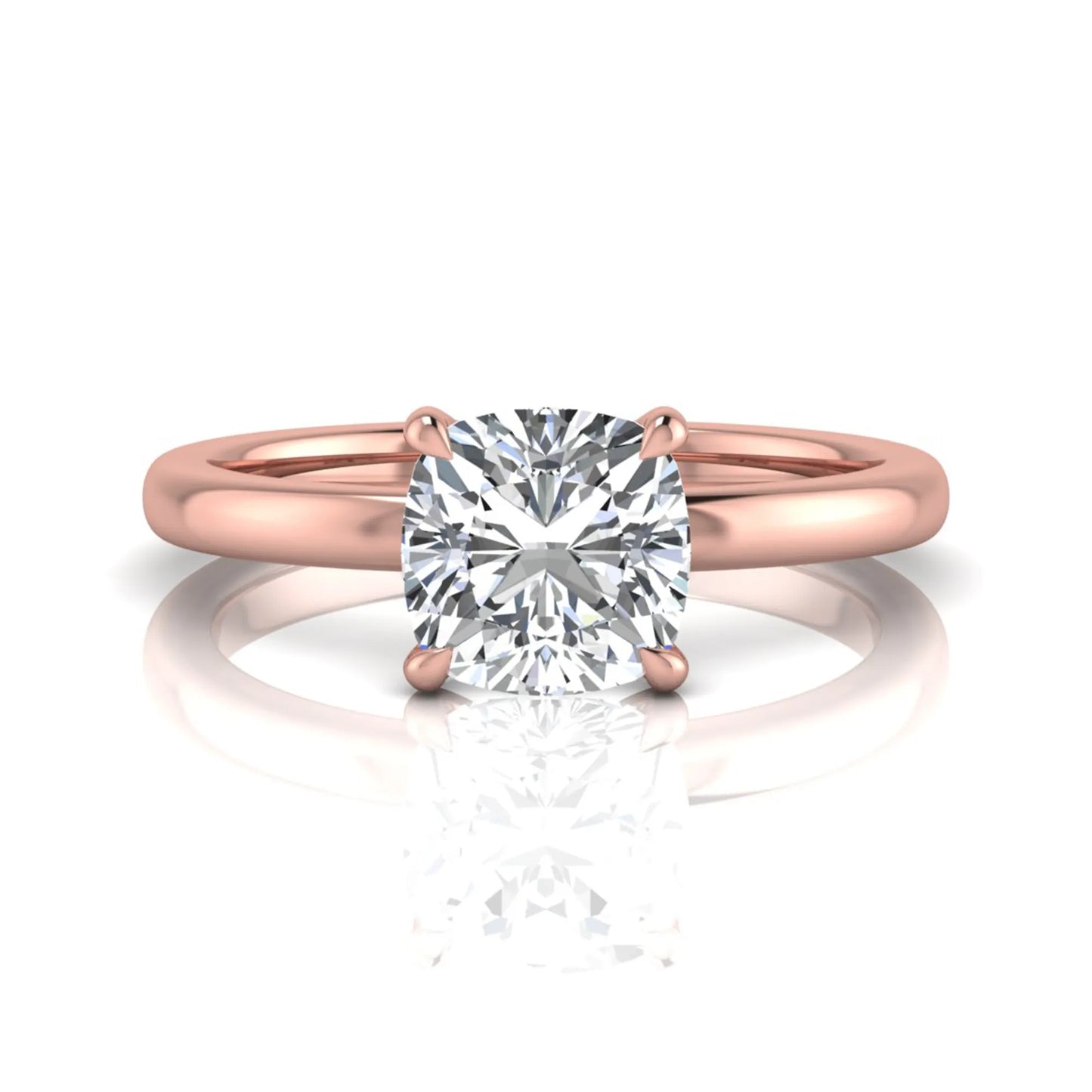 Cushion cut lab grown diamond solitaire engagement ring featuring a 1.28 carat IGI certified center diamond in a classic four-prong setting in rose gold