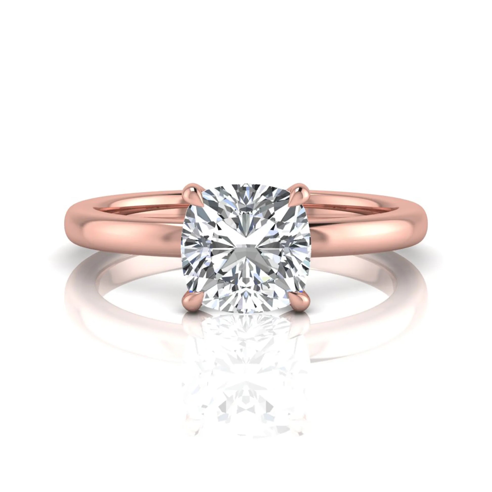 Cushion cut lab grown diamond solitaire engagement ring featuring a 1.28 carat IGI certified center diamond in a classic four-prong setting in rose gold