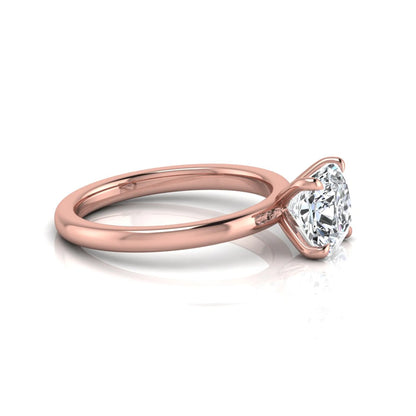 Cushion cut lab grown diamond solitaire engagement ring featuring a 1.28 carat IGI certified center diamond in a classic four-prong setting in rose gold