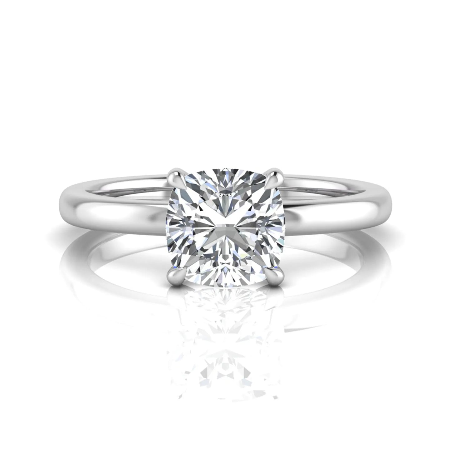 Cushion cut lab grown diamond solitaire engagement ring featuring a 1.28 carat IGI certified center diamond in a classic four-prong setting in white gold