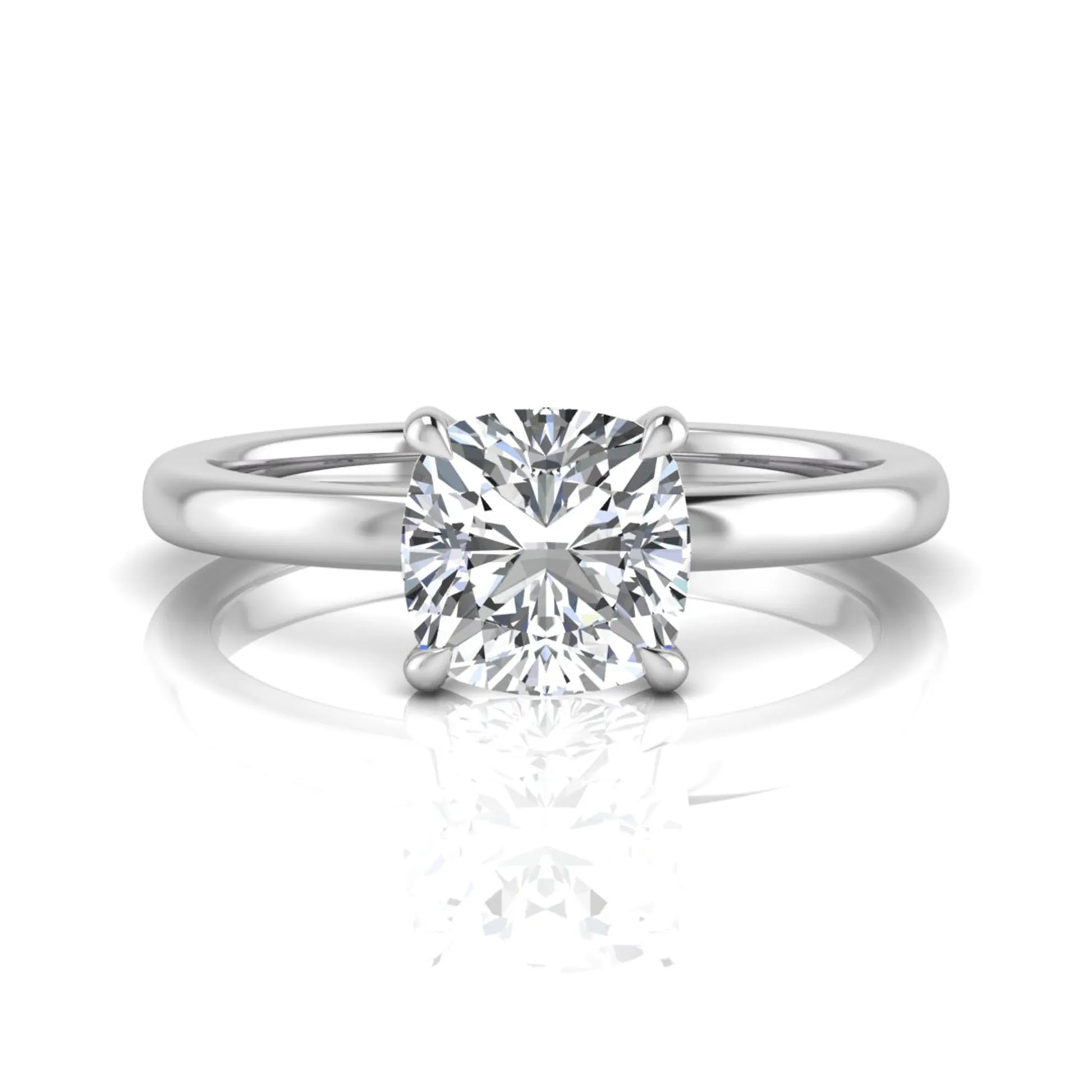 Cushion cut lab grown diamond solitaire engagement ring featuring a 1.28 carat IGI certified center diamond in a classic four-prong setting in white gold