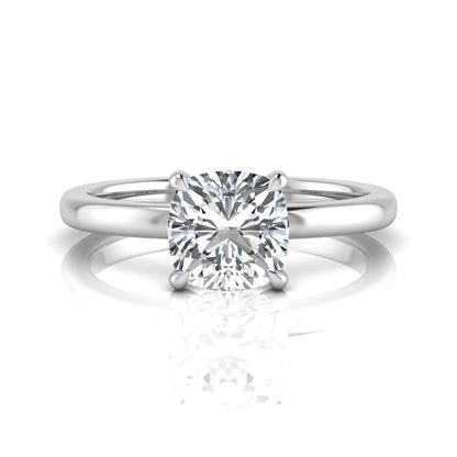 Cushion cut lab grown diamond solitaire engagement ring featuring a 1.28 carat IGI certified center diamond in a classic four-prong setting in white gold
