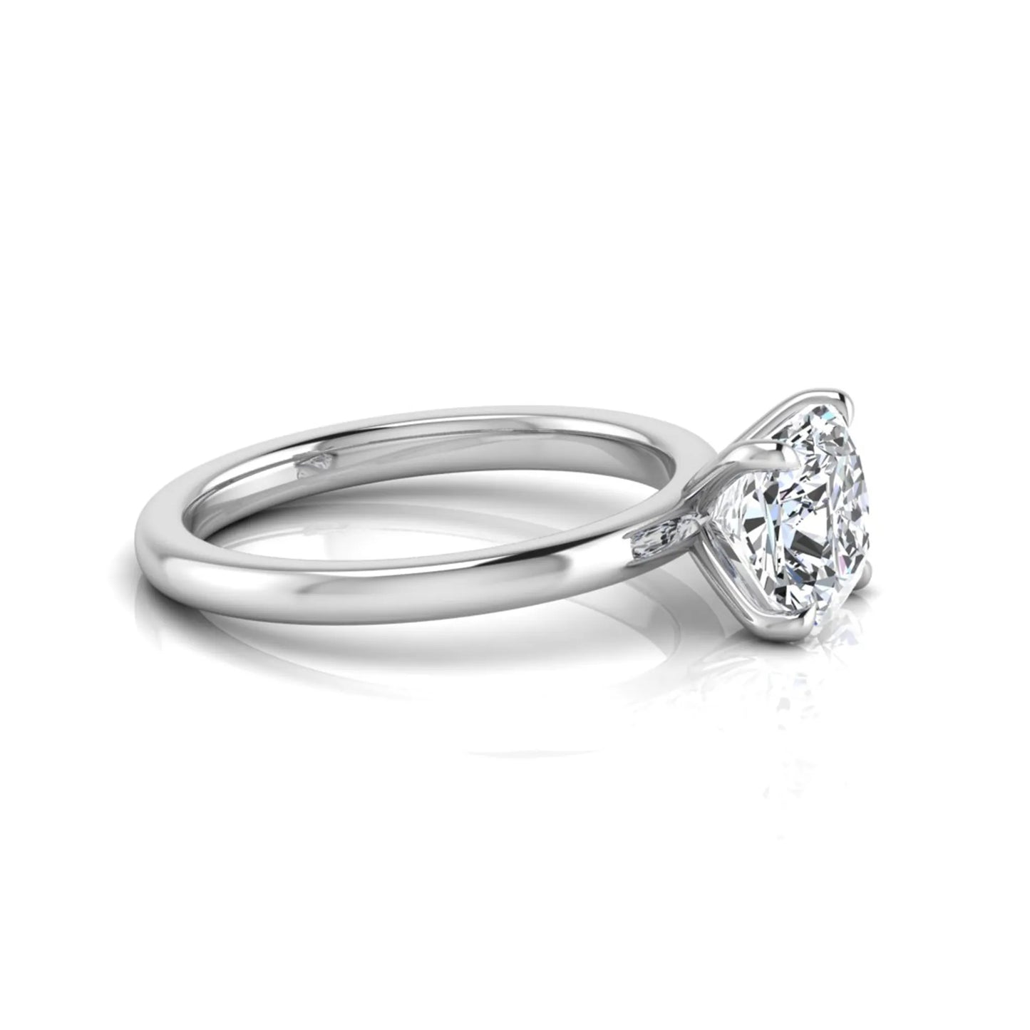 Cushion cut lab grown diamond solitaire engagement ring featuring a 1.28 carat IGI certified center diamond in a classic four-prong setting in white gold