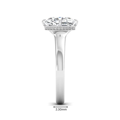 IGI certified cushion cut lab grown diamond solitaire engagement ring with hidden halo in white gold.