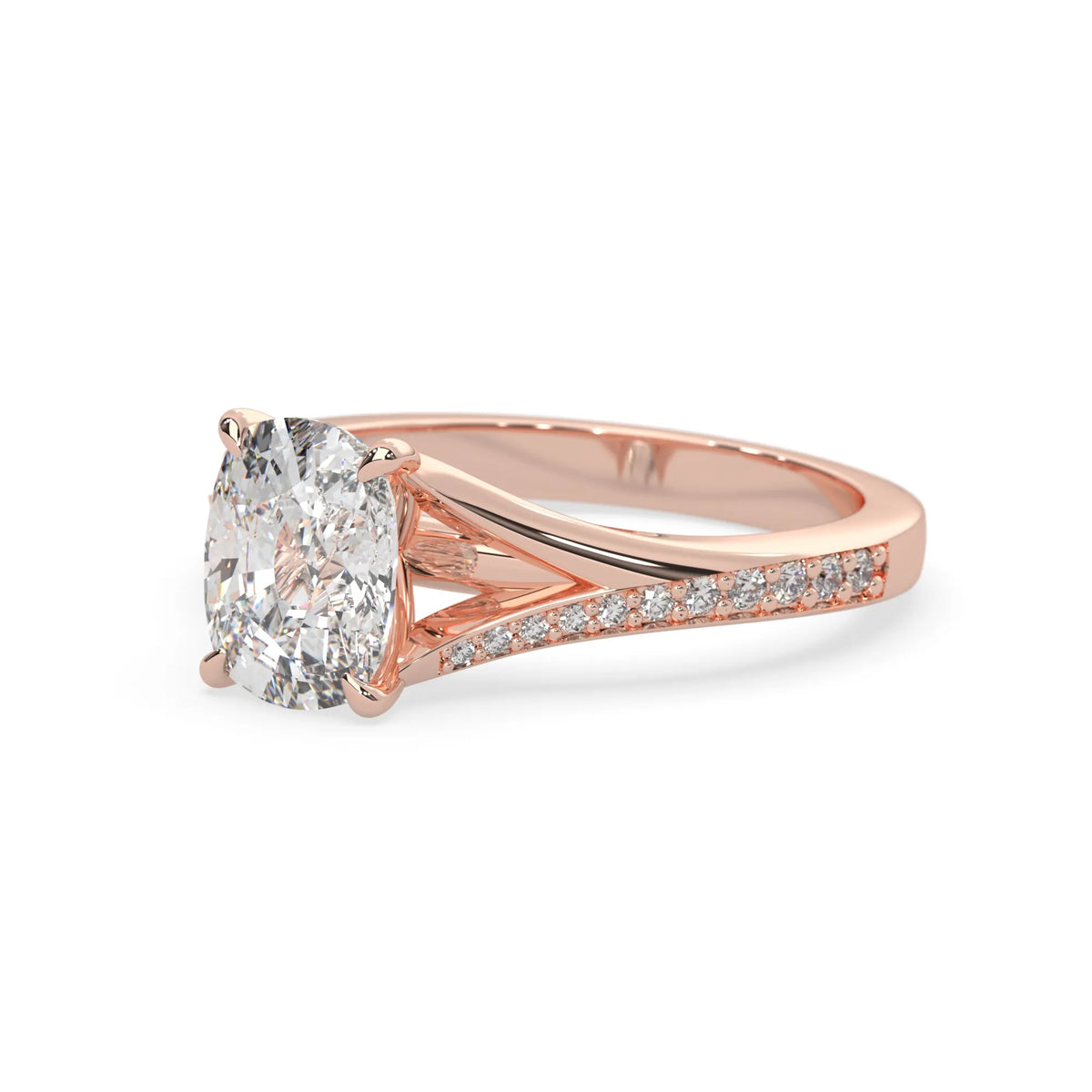 Rose gold ring with a large lab grown diamond and smaller diamonds on the band against a white background