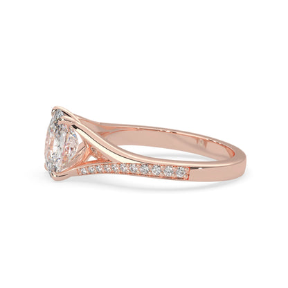 Rose gold ring with a lab grown  diamond on a white background