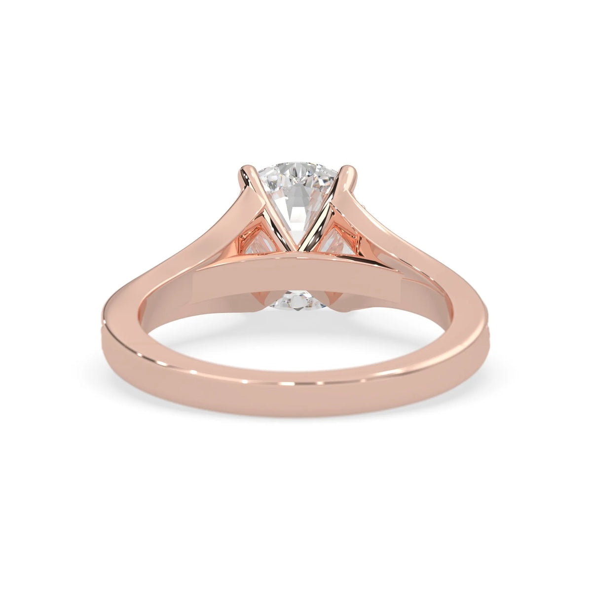 Rose gold ring with a lab grown  diamond on a white background