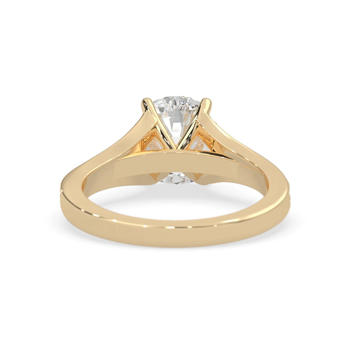 yellow Gold ring with a diamond on a white background