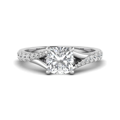 Cushion cut lab grown diamond split shank pavé engagement ring with four-prong setting and white gold band.