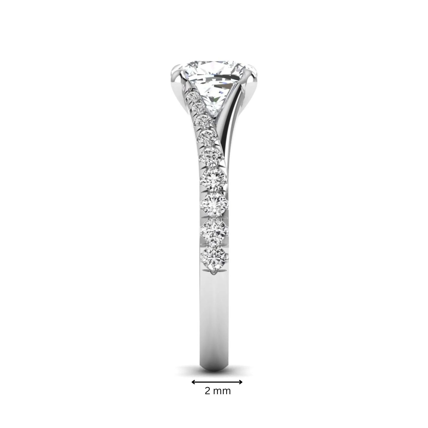 Cushion cut lab grown diamond split shank pavé engagement ring with four-prong setting and white gold band.