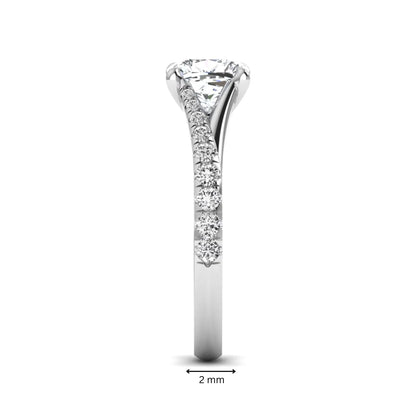 Cushion cut lab grown diamond split shank pavé engagement ring with four-prong setting and white gold band.