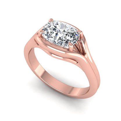 IGI certified cushion cut lab grown diamond split shank solitaire engagement ring in rose gold.