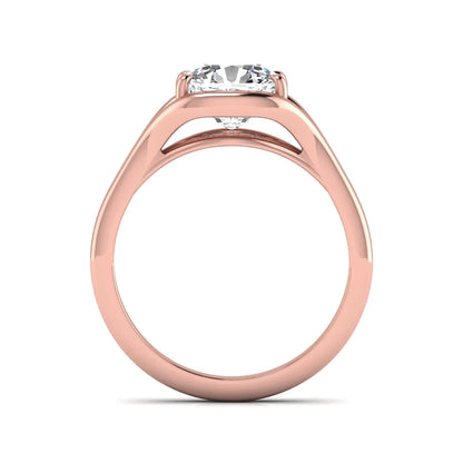IGI certified cushion cut lab grown diamond split shank solitaire engagement ring in rose gold.