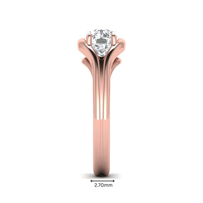 IGI certified cushion cut lab grown diamond split shank solitaire engagement ring in rose gold.