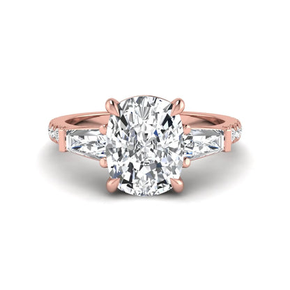 Cushion cut three stone lab grown diamond engagement ring featuring a 3.06 carat IGI certified cushion cut center diamond with tapered baguette side diamonds and pavé shank in rose gold.