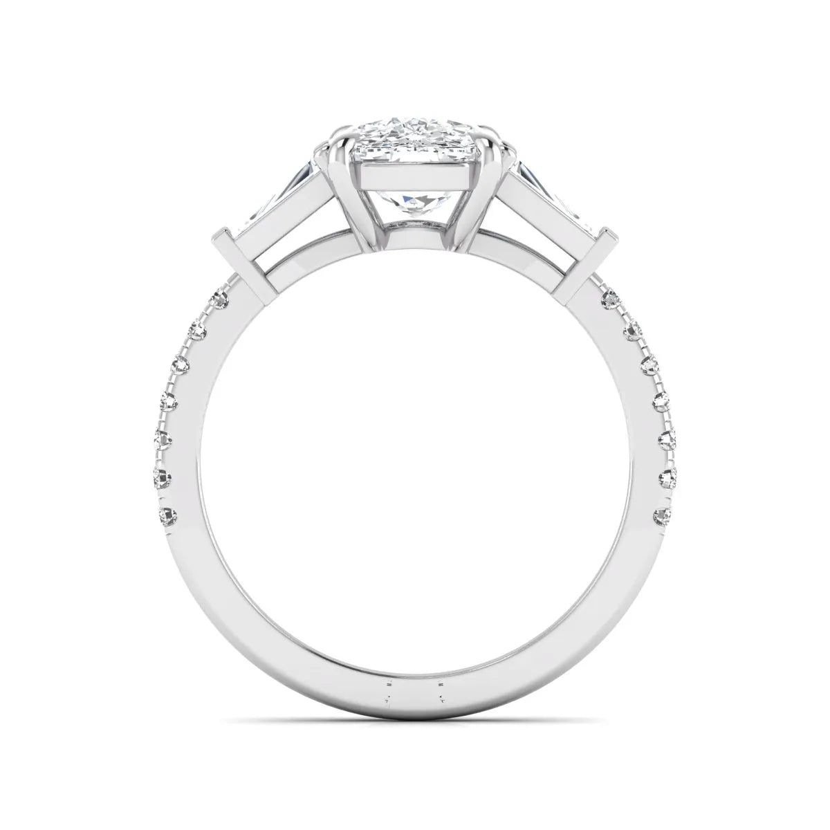 Cushion cut three stone lab grown diamond engagement ring featuring a 3.06 carat IGI certified cushion cut center diamond with tapered baguette side diamonds and pavé shank in white gold.