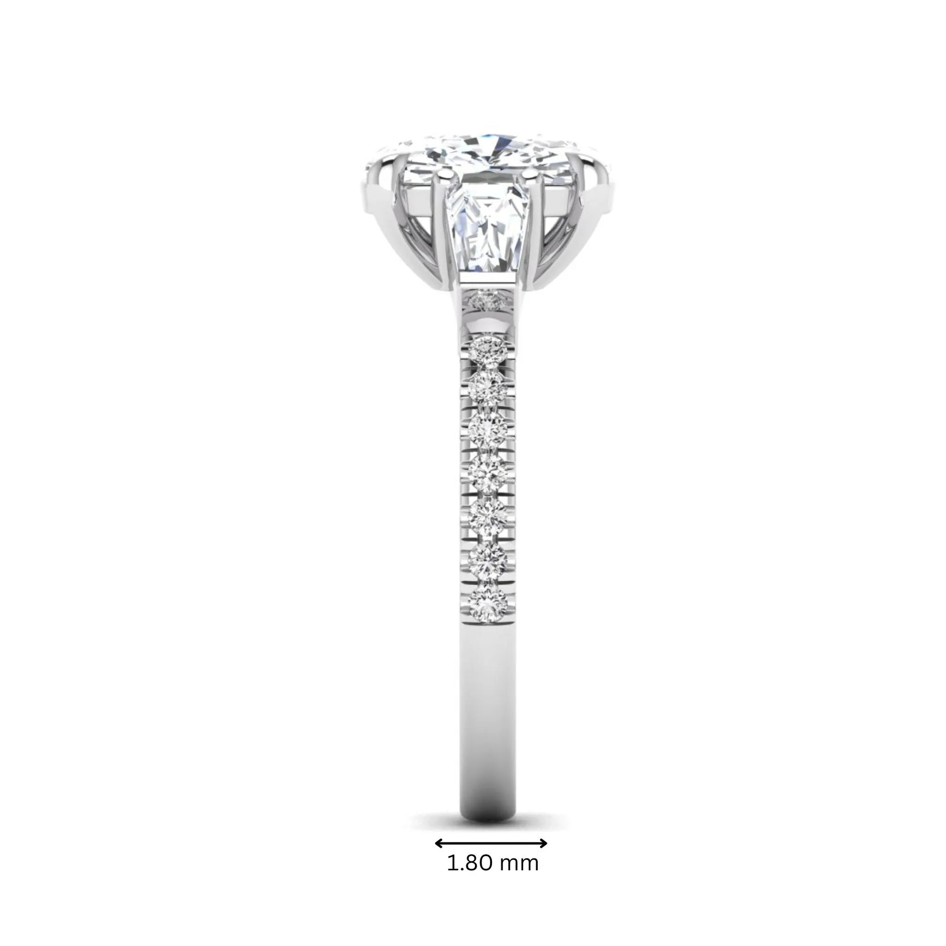 Cushion cut three stone lab grown diamond engagement ring featuring a 3.06 carat IGI certified cushion cut center diamond with tapered baguette side diamonds and pavé shank in white gold.