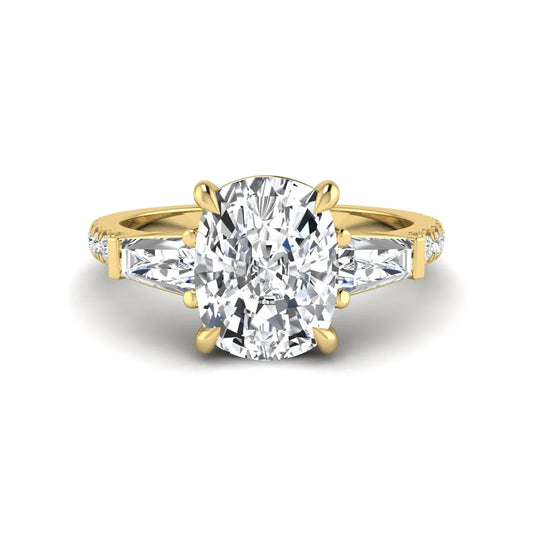 Cushion cut three stone lab grown diamond engagement ring featuring a 3.06 carat IGI certified cushion cut center diamond with tapered baguette side diamonds and pavé shank in yellow gold.