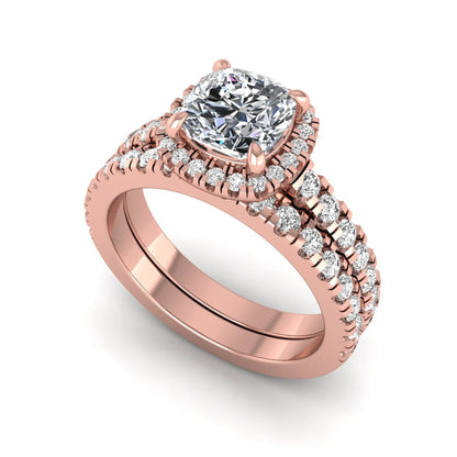 Cushion Halo Bridal Ring Set featuring a 6.00 mm cushion-cut lab grown diamond with a cushion halo, pavé cathedral engagement ring, and matching pavé wedding band in rose gold