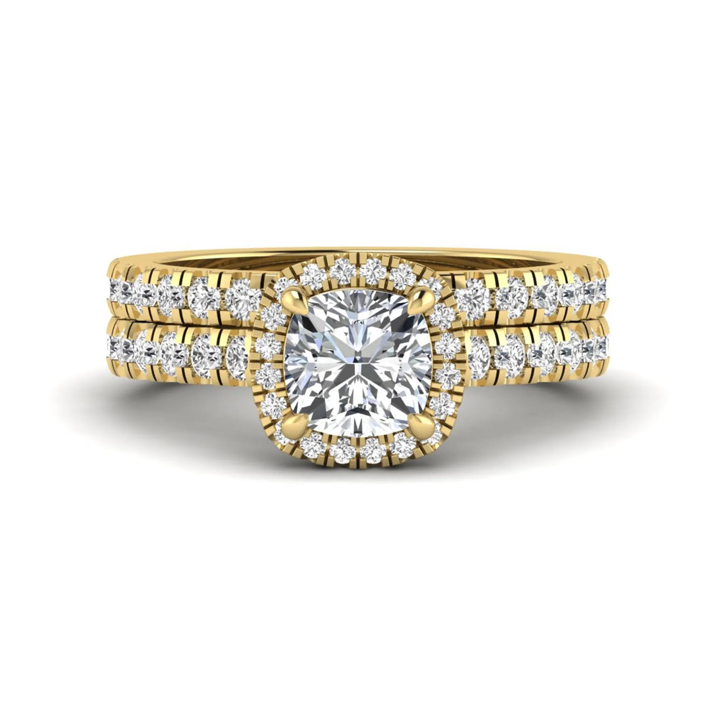 Cushion Halo Bridal Ring Set featuring a 6.00 mm cushion-cut lab grown diamond with a cushion halo, pavé cathedral engagement ring, and matching pavé wedding band in yellow gold