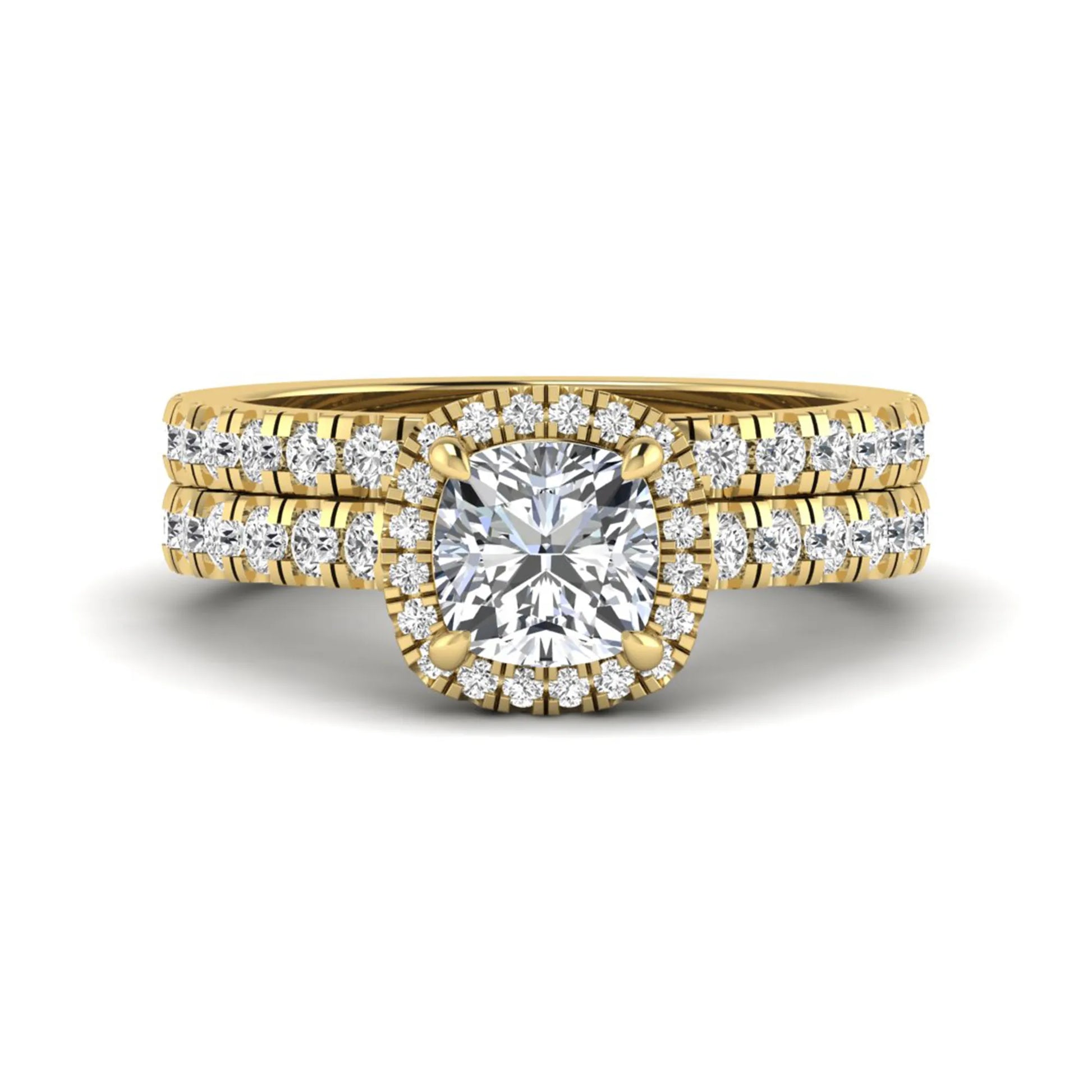 Cushion Halo Bridal Ring Set featuring a 6.00 mm cushion-cut lab grown diamond with a cushion halo, pavé cathedral engagement ring, and matching pavé wedding band in yellow gold