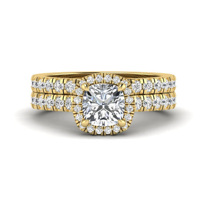 Cushion Halo Bridal Ring Set featuring a 6.00 mm cushion-cut lab grown diamond with a cushion halo, pavé cathedral engagement ring, and matching pavé wedding band in yellow gold