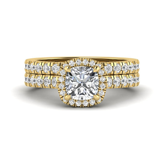 Cushion Halo Bridal Ring Set featuring a 6.00 mm cushion-cut lab grown diamond with a cushion halo, pavé cathedral engagement ring, and matching pavé wedding band in yellow gold