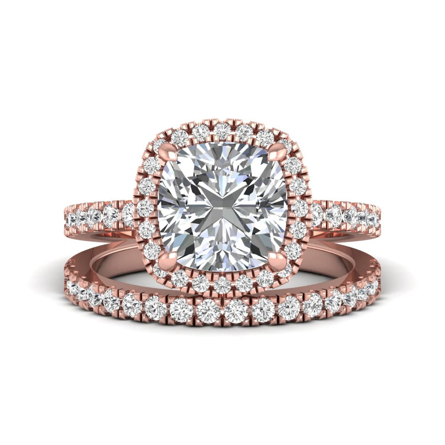 Cushion cut lab grown diamond bridal ring set featuring a halo engagement ring with a matching pavé diamond wedding band in a rose gold style design.