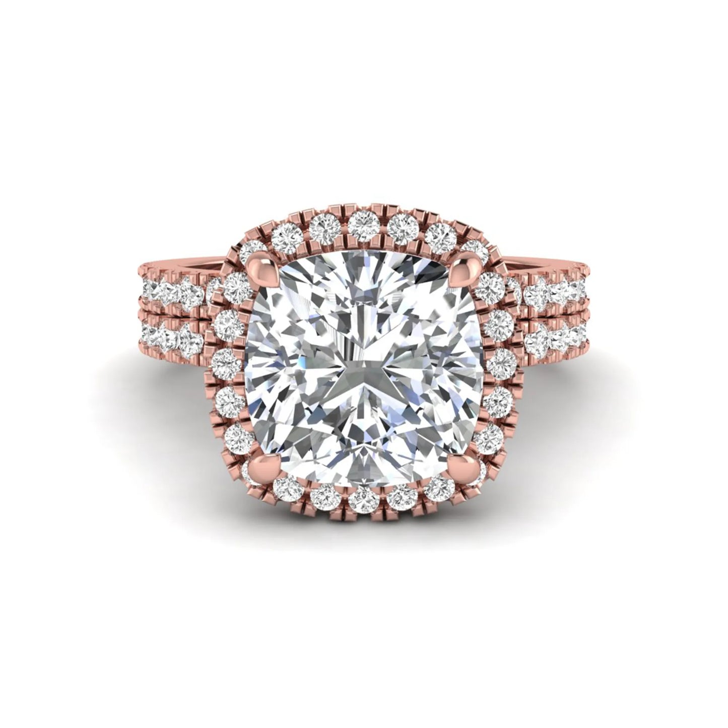 Cushion cut lab grown diamond bridal ring set featuring a halo engagement ring with a matching pavé diamond wedding band in a rose gold style design.