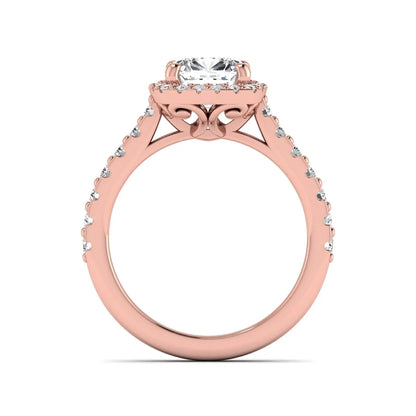 Cushion cut lab grown diamond halo engagement ring featuring a four-prong center diamond, round diamond halo, and pavé diamond band in a rose gold finish.