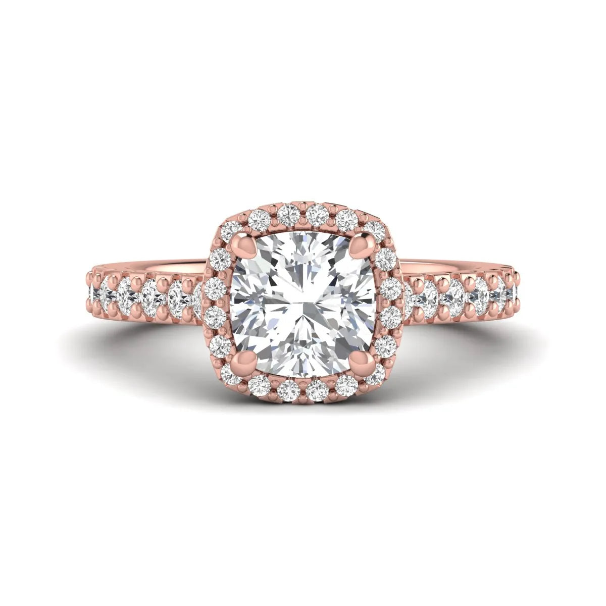 Cushion cut lab grown diamond halo engagement ring featuring a four-prong center diamond, round diamond halo, and pavé diamond band in a rose gold finish.