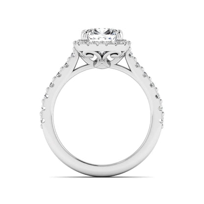 Cushion cut lab grown diamond halo engagement ring featuring a four-prong center diamond, round diamond halo, and pavé diamond band in a white gold finish.