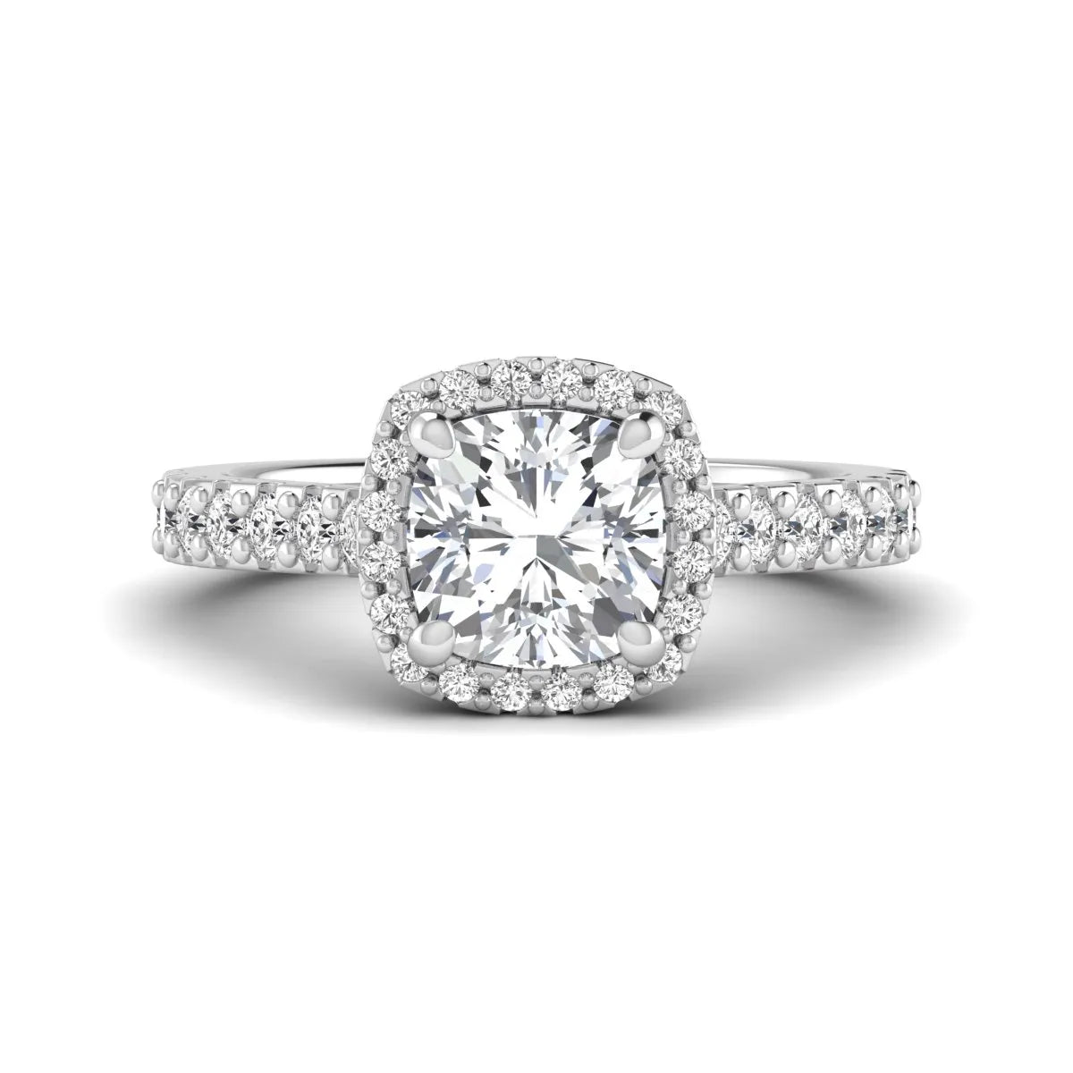 Cushion cut lab grown diamond halo engagement ring featuring a four-prong center diamond, round diamond halo, and pavé diamond band in a white gold finish.