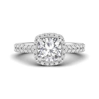 Cushion cut lab grown diamond halo engagement ring featuring a four-prong center diamond, round diamond halo, and pavé diamond band in a white gold finish.