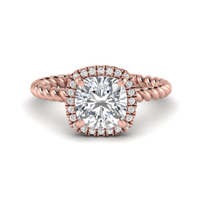 Cushion cut lab grown diamond halo engagement ring featuring a twisted rope band, four-prong setting, and round accent diamonds in a rose gold tone design.